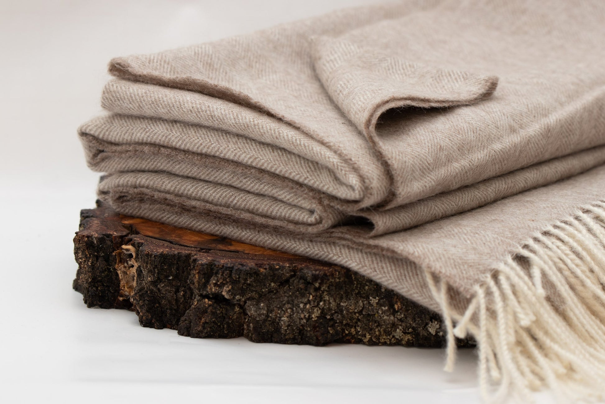 Wohndecke Fischgrätmuster beige-weiß