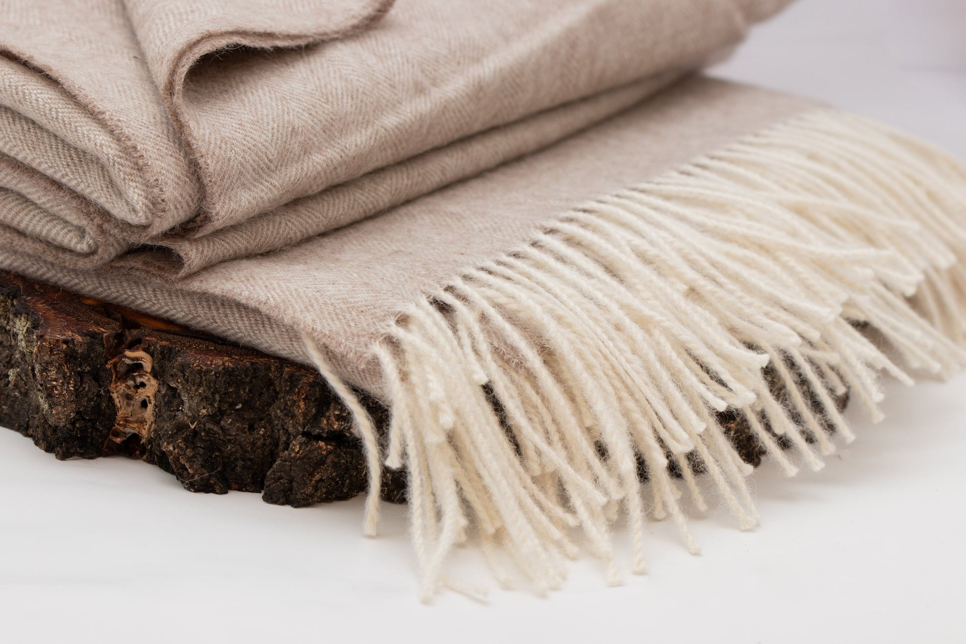Wohndecke Fischgrätmuster beige-weiß